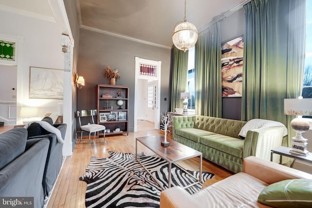  - living room featuring crown molding and wood-type flooring