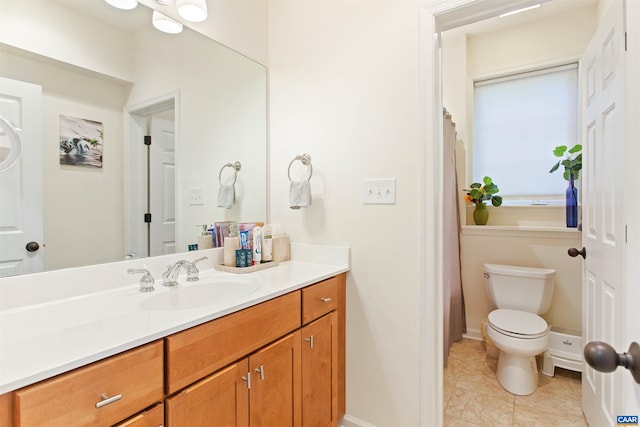 1623 Brandywine Dr, Charlottesville, VA 22901 - bathroom featuring toilet, vanity, baseboards, and tile patterned flooring