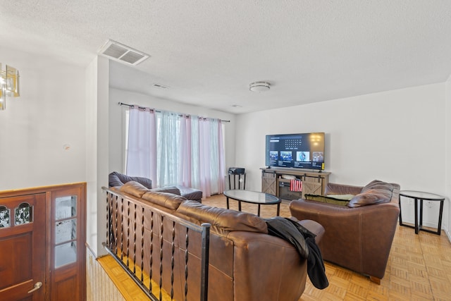 728 Foley Rd, Harrisonburg, VA 22801 - living room with a textured ceiling and visible vents
