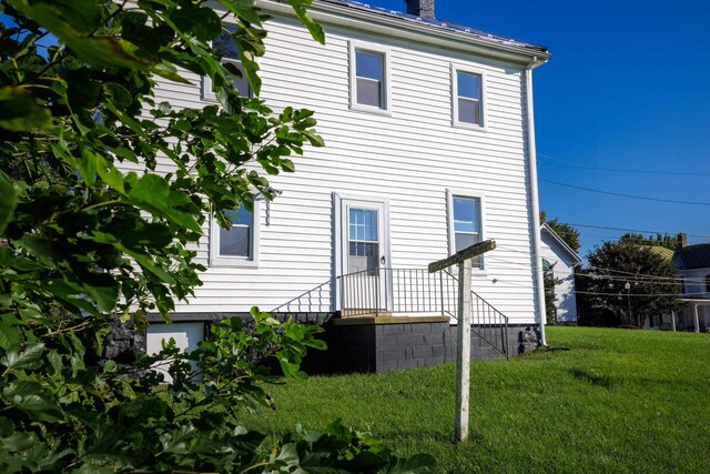 111 S High St, Edinburg, VA 22824 - back of property featuring a yard and a chimney