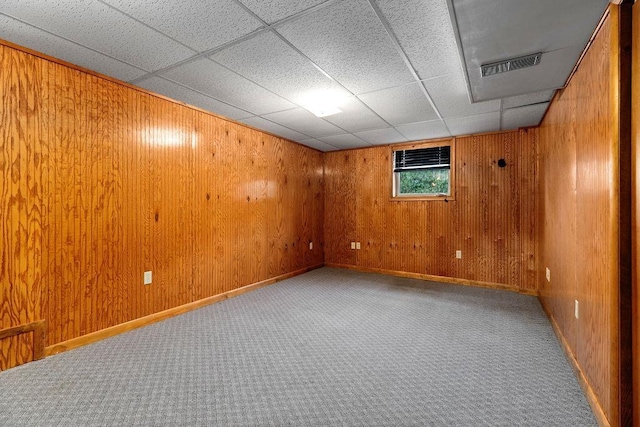 304 Burnley Dr, Staunton, VA 24401 - unfurnished room with wood walls, carpet flooring, and a paneled ceiling