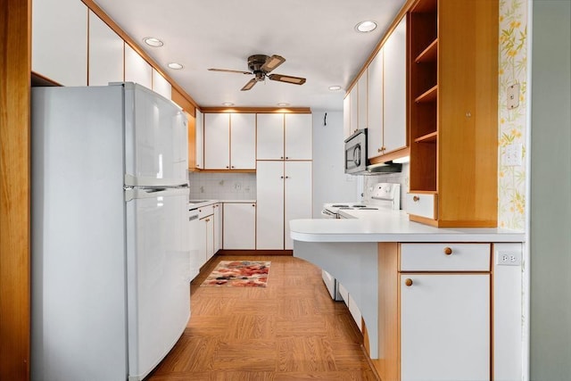 304 Burnley Dr, Staunton, VA 24401 - kitchen featuring white appliances, open shelves, a ceiling fan, backsplash, and a peninsula