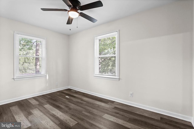 313 Burman Ln, Fredericksburg, VA 22407 - spare room with healthy amount of natural light, dark wood finished floors, and baseboards