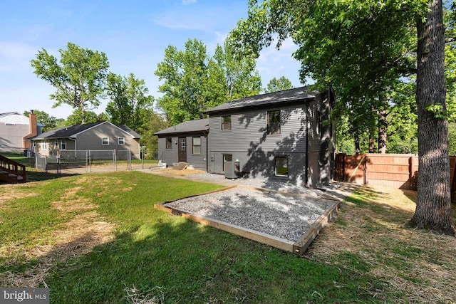 313 Burman Ln, Fredericksburg, VA 22407 - rear view of house featuring a gate