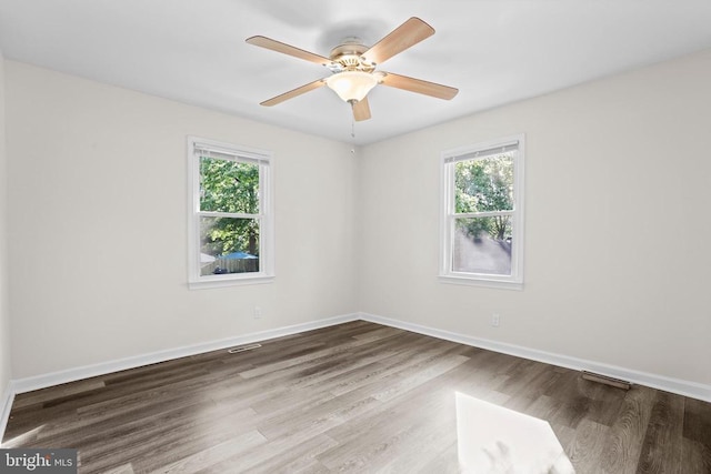 313 Burman Ln, Fredericksburg, VA 22407 - unfurnished room with plenty of natural light, wood finished floors, baseboards, and a ceiling fan