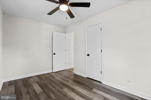 313 Burman Ln, Fredericksburg, VA 22407 - unfurnished bedroom with wood finished floors, baseboards, and ceiling fan