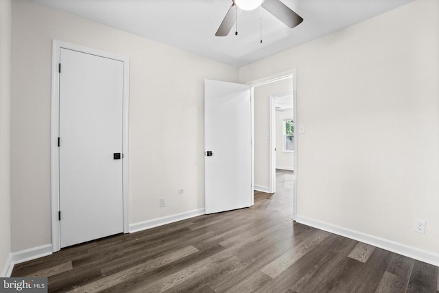 313 Burman Ln, Fredericksburg, VA 22407 - unfurnished bedroom featuring dark wood finished floors, baseboards, and ceiling fan