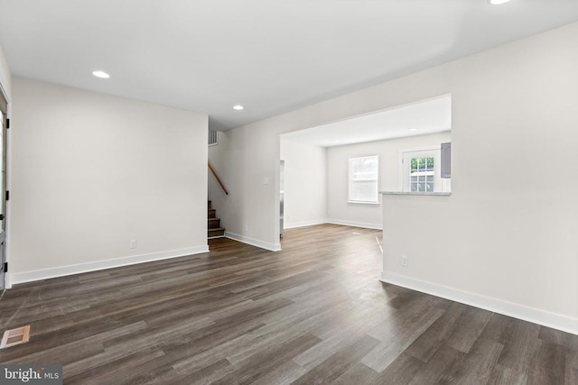 313 Burman Ln, Fredericksburg, VA 22407 - empty room with stairway, dark wood-style flooring, recessed lighting, and baseboards