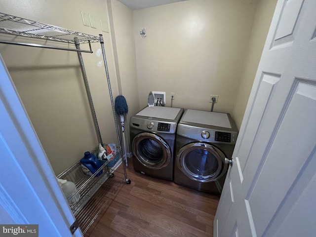 902 Eastover Pkwy, Locust Grove, VA 22508 - laundry area featuring washing machine and dryer and wood finished floors