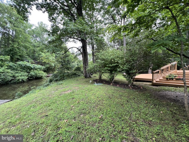 902 Eastover Pkwy, Locust Grove, VA 22508 - view of green lawn with a deck