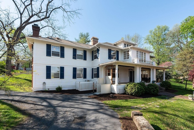 675 Beverley St E, Staunton, VA 24401 - view of front of home featuring a chimney, a porch, and a front lawn