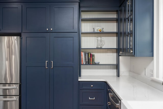 675 Beverley St E, Staunton, VA 24401 - kitchen featuring freestanding refrigerator, open shelves, blue cabinets, and dishwashing machine