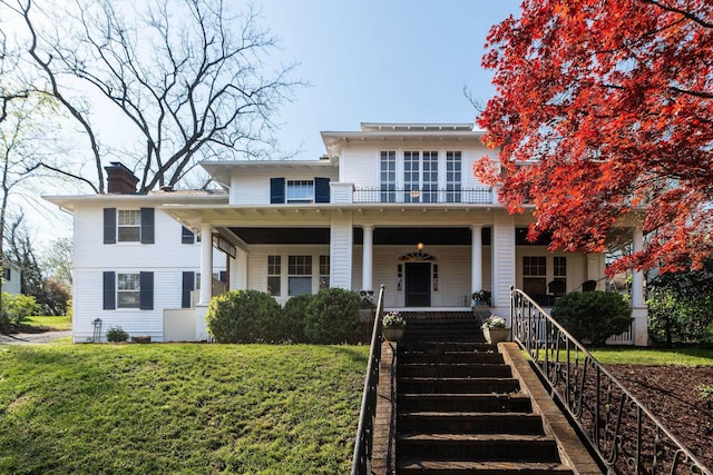 675 Beverley St E, Staunton, VA 24401 - view of front of house with a front yard, a porch, a chimney, and stairs