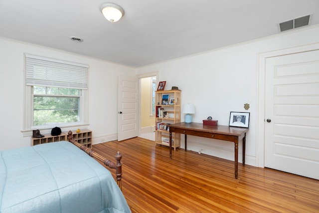 675 Beverley St E, Staunton, VA 24401 - bedroom with light wood-style floors, ornamental molding, and baseboards