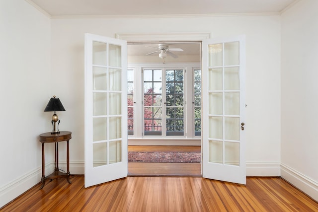 675 Beverley St E, Staunton, VA 24401 - doorway with wood finished floors, french doors, baseboards, ceiling fan, and ornamental molding