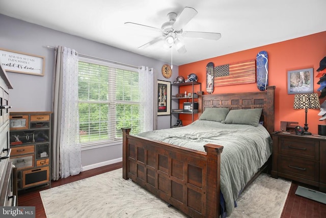 10708 Live Oak Ct, Fredericksburg, VA 22407 - bedroom with multiple windows, wood finished floors, and a ceiling fan