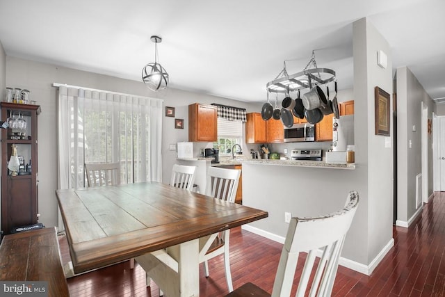 10708 Live Oak Ct, Fredericksburg, VA 22407 - dining space with dark wood-type flooring and baseboards
