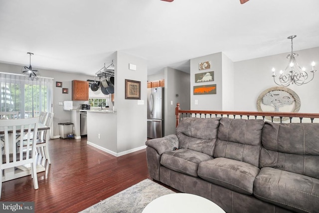 10708 Live Oak Ct, Fredericksburg, VA 22407 - living area with a chandelier and dark wood-style flooring