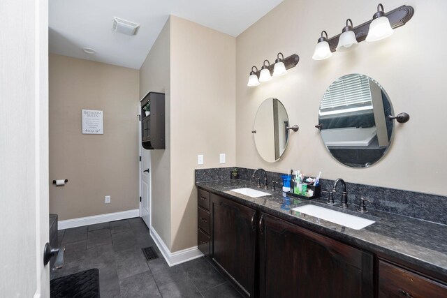 82 Willow Ln, Waynesboro, VA 22980 - bathroom with double vanity, baseboards, and tile patterned floors