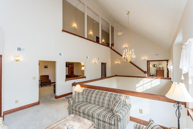 2226 Lanier Ln, Mcgaheysville, VA 22840 - living area featuring light colored carpet, high vaulted ceiling, ceiling fan, and a chandelier