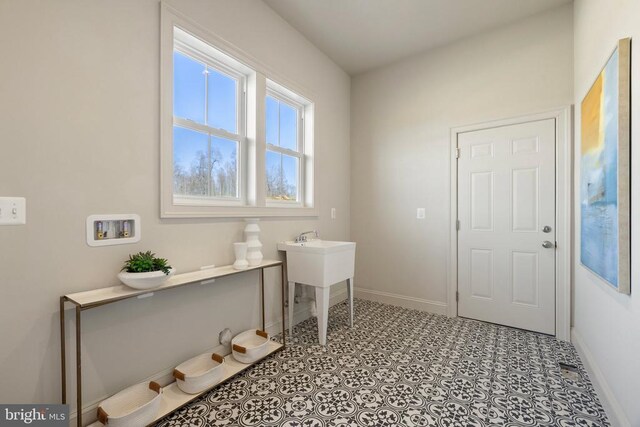 7039 Silk, Jeffersonton, VA 22724 - washroom featuring hookup for a washing machine and baseboards