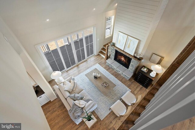 7039 Silk, Jeffersonton, VA 22724 - living area featuring a fireplace, healthy amount of natural light, wood finished floors, and recessed lighting