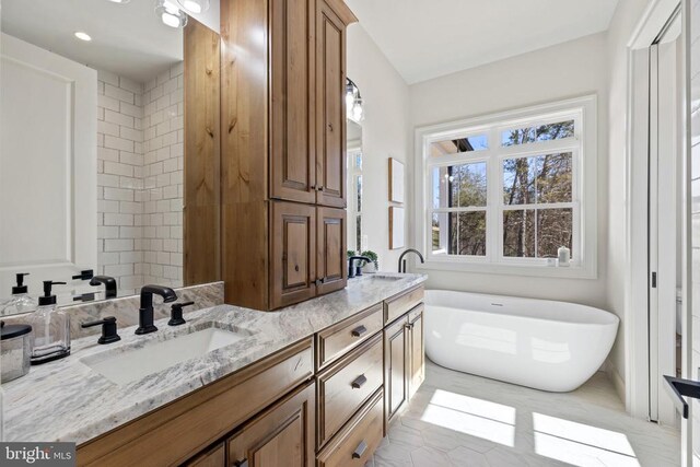 7039 Silk, Jeffersonton, VA 22724 - bathroom featuring a soaking tub and double vanity