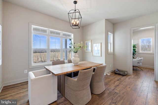 7039 Silk, Jeffersonton, VA 22724 - dining room with a chandelier, wood finished floors, and baseboards
