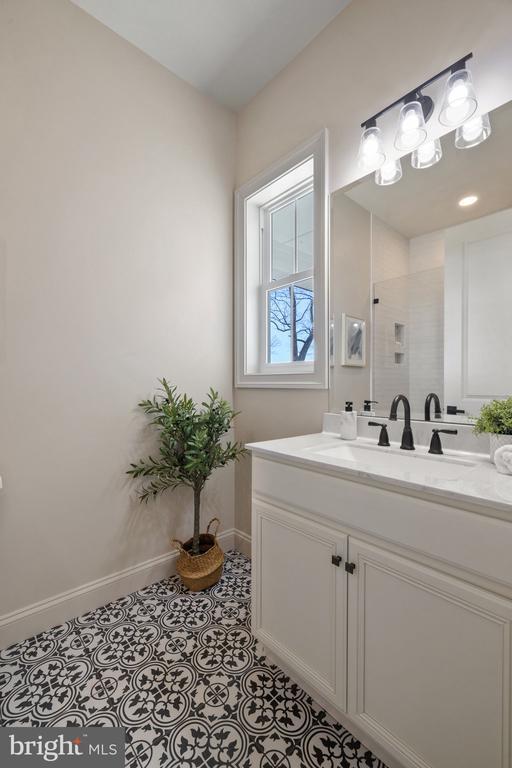 7039 Silk, Jeffersonton, VA 22724 - full bath featuring a stall shower, vanity, and baseboards