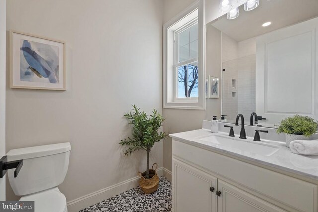 7039 Silk, Jeffersonton, VA 22724 - full bath with baseboards, toilet, vanity, and tiled shower