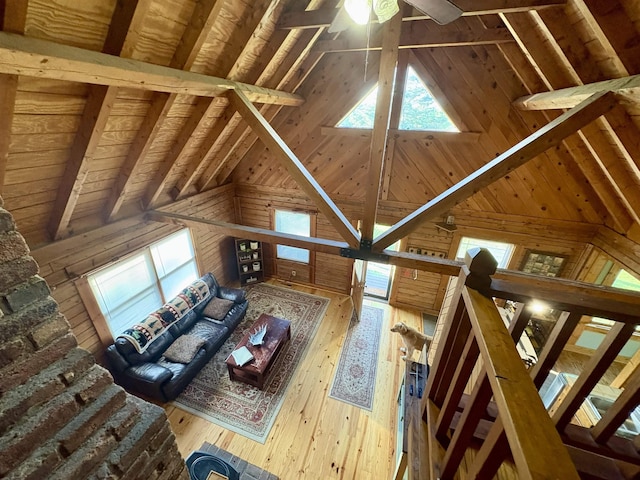 79 River Ridge Rd, Verona, VA 24482 - unfurnished living room with wood walls, plenty of natural light, ceiling fan, and hardwood / wood-style floors