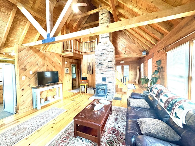 79 River Ridge Rd, Verona, VA 24482 - living area featuring high vaulted ceiling, plenty of natural light, wood walls, wood-type flooring, and a wooden ceiling with exposed beams