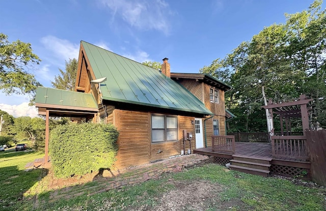 79 River Ridge Rd, Verona, VA 24482 - back of property with a standing seam roof, a chimney, a metal roof, and a deck