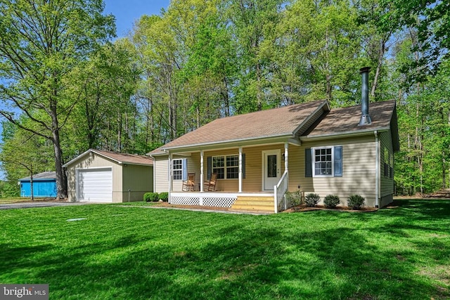 343 Aspen Hill Rd, Mineral, VA 23117 - view of front facade featuring a porch, an outdoor structure, a garage, a front yard, and driveway