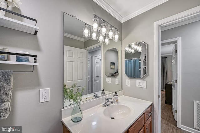 343 Aspen Hill Rd, Mineral, VA 23117 - bathroom featuring crown molding, wood finished floors, and vanity