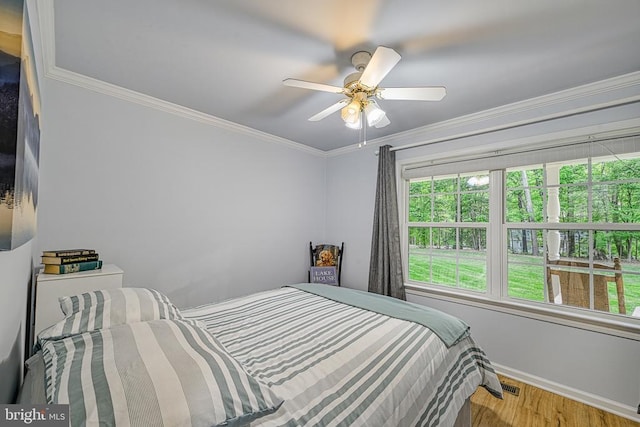 343 Aspen Hill Rd, Mineral, VA 23117 - bedroom featuring wood finished floors, baseboards, ornamental molding, and a ceiling fan