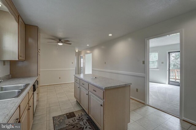 202 Cutler Ave, Louisa, VA 23093 - kitchen featuring a kitchen island, light tile patterned flooring, light brown cabinets, light countertops, and recessed lighting