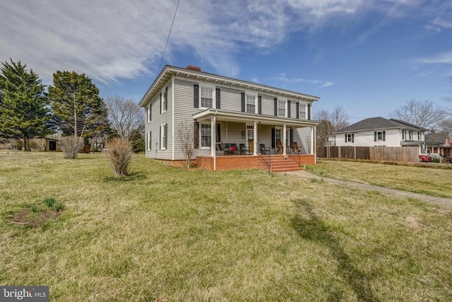 202 Cutler Ave, Louisa, VA 23093 - back of house with covered porch and a chimney