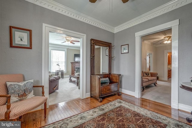 202 Cutler Ave, Louisa, VA 23093 - living area featuring ceiling fan, crown molding, hardwood / wood-style floors, and baseboards