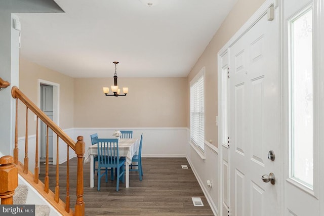7504 Heathrow Dr, Fredericksburg, VA 22407 - entryway with wood finished floors, stairs, and a chandelier