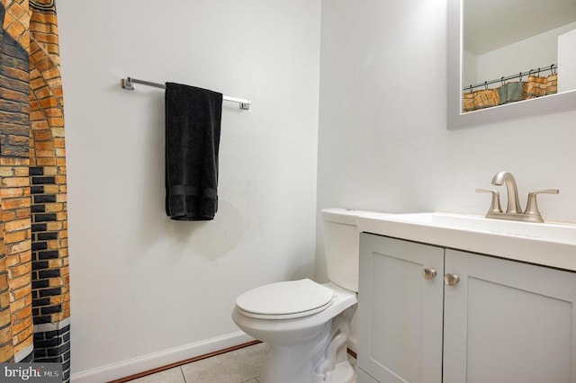 7504 Heathrow Dr, Fredericksburg, VA 22407 - full bath with tile patterned flooring, vanity, toilet, and baseboards