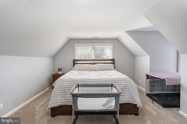 7504 Heathrow Dr, Fredericksburg, VA 22407 - bedroom featuring carpet floors, vaulted ceiling, and baseboards