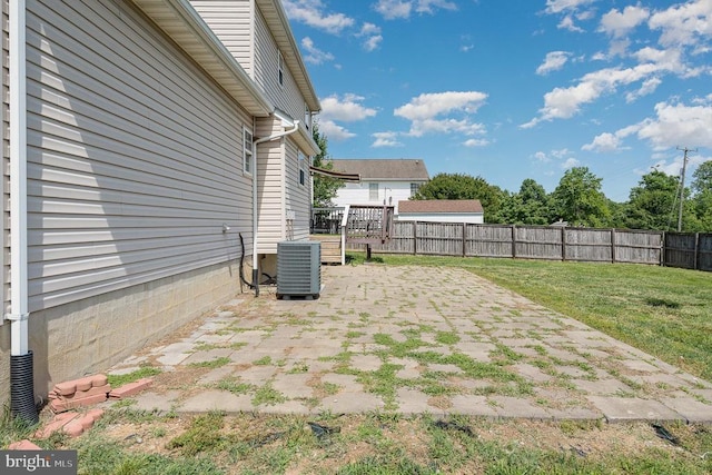 7504 Heathrow Dr, Fredericksburg, VA 22407 - view of yard with central air condition unit and a patio area