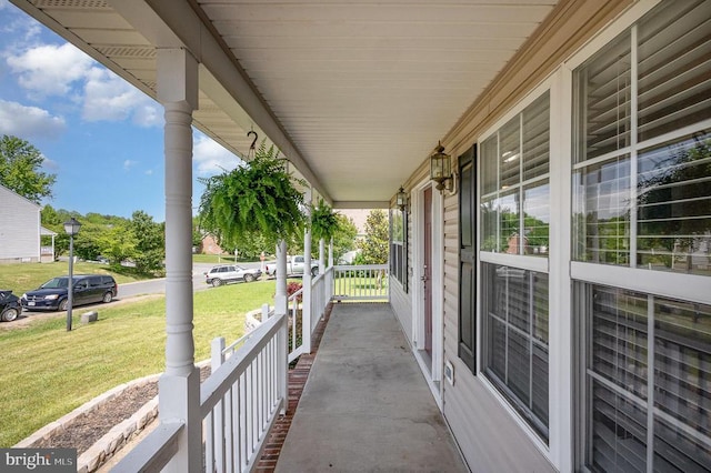 7504 Heathrow Dr, Fredericksburg, VA 22407 - covered porch featuring a lawn