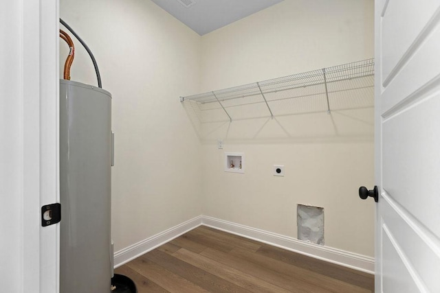 1019 Frye St, Waynesboro, VA 22980 - laundry area with dark wood-style flooring, hookup for an electric dryer, washer hookup, and water heater