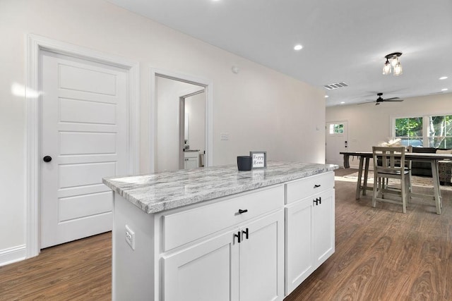 1019 Frye St, Waynesboro, VA 22980 - kitchen featuring dark wood finished floors, ceiling fan, white cabinets, recessed lighting, and a center island