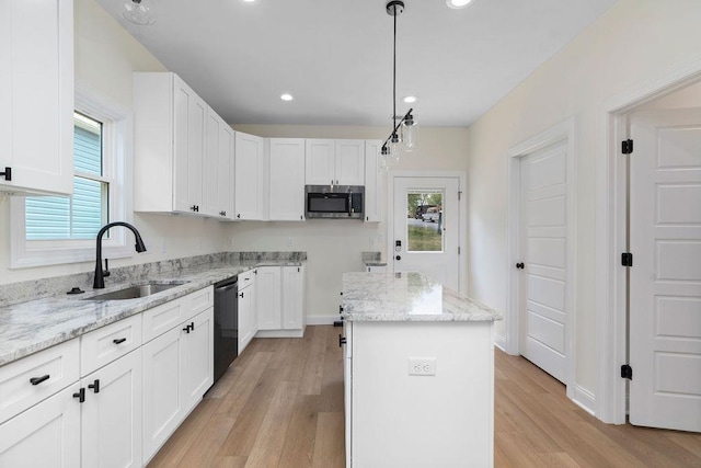 1019 Frye St, Waynesboro, VA 22980 - kitchen featuring stainless steel microwave, dishwasher, light wood-type flooring, white cabinets, and recessed lighting