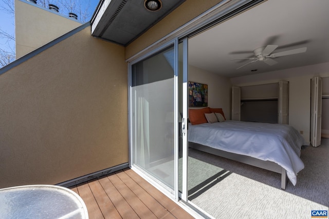 bedroom with light wood-style flooring and a ceiling fan