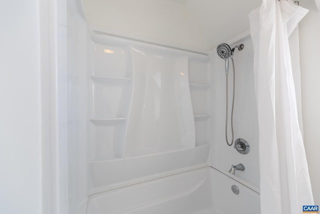 bathroom featuring curtained shower