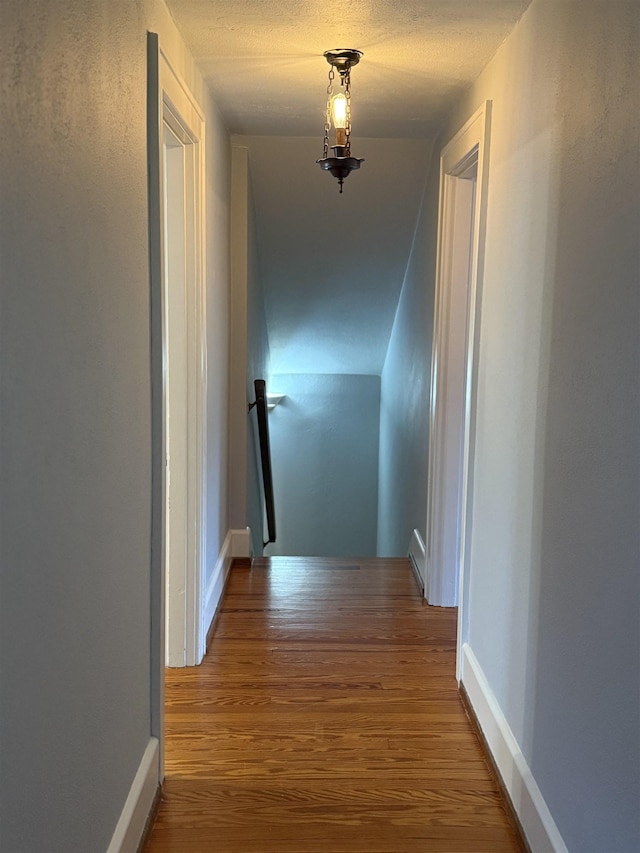 228 Hendren Ave, Staunton, VA 24401 - corridor featuring wood finished floors, an upstairs landing, and baseboards